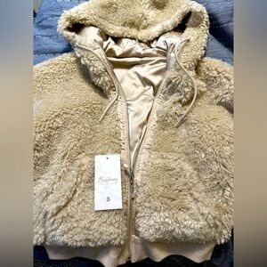 BRAND NEW BuffBunny faux fur reversible cropped jacket.